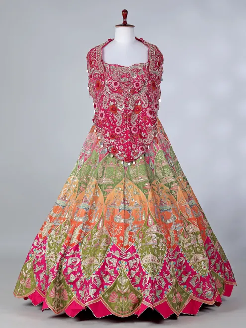 Rani pink silk designer lehenga choli with motifs