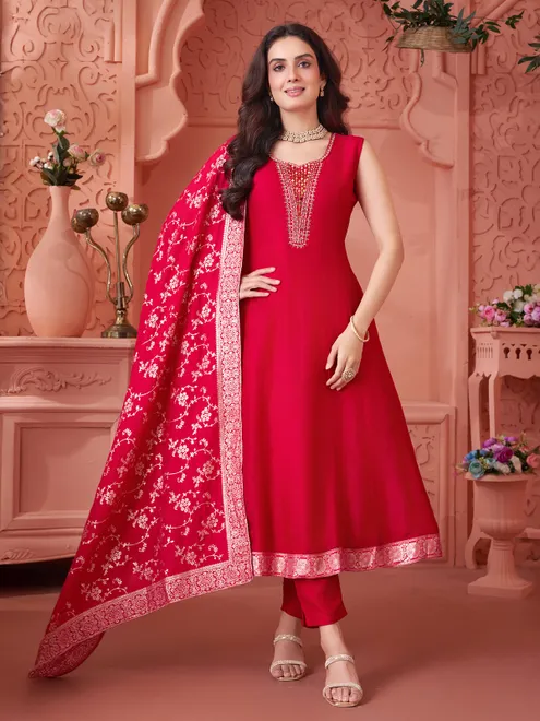Rani pink silk salwar suit with royal festive brilliance