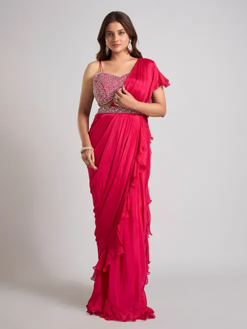 Rani pink silk saree with sparkling aabla accents