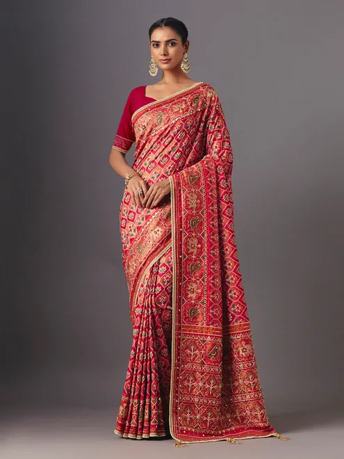 Red art silk patola saree with traditional animal and bird artistry