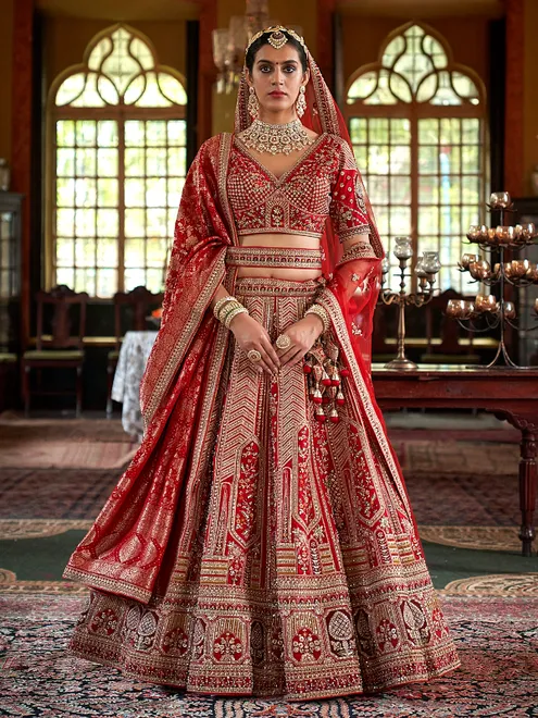 Red bridal silk lehenga choli with heavy embellishment