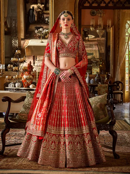 Red bridal silk lehenga choli with rich sequins embellishment