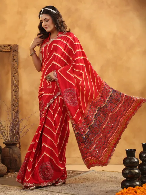 Red printed silk saree with aabla and resham work