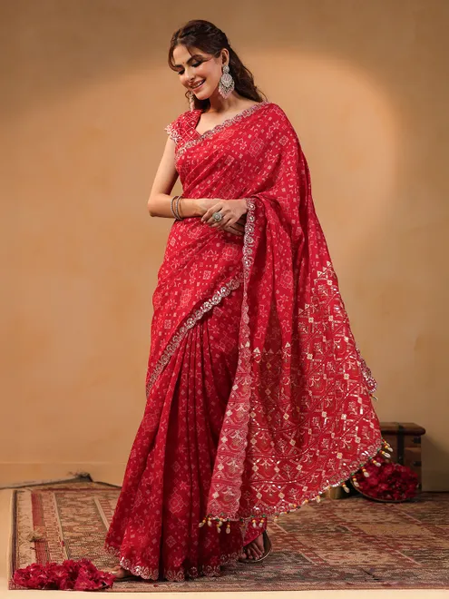 Red printed silk saree with resham embellishment