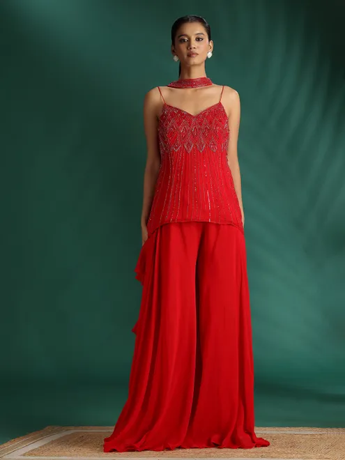 Red palazzo suit with cutdana embellishments