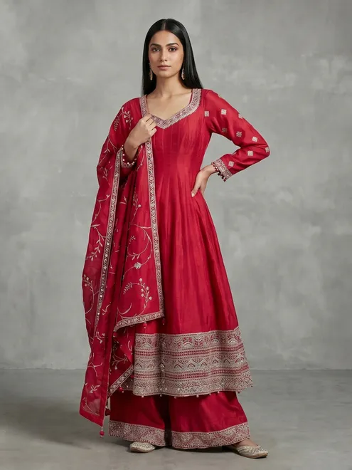 Red silk anarkali suit with pearl embellishments