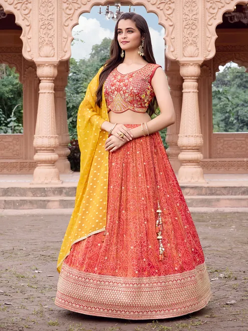 Red silk bandhej print lehenga choli with stones work
