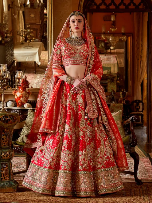 Red silk bridal lehenga choli with rich resham emberoidrey