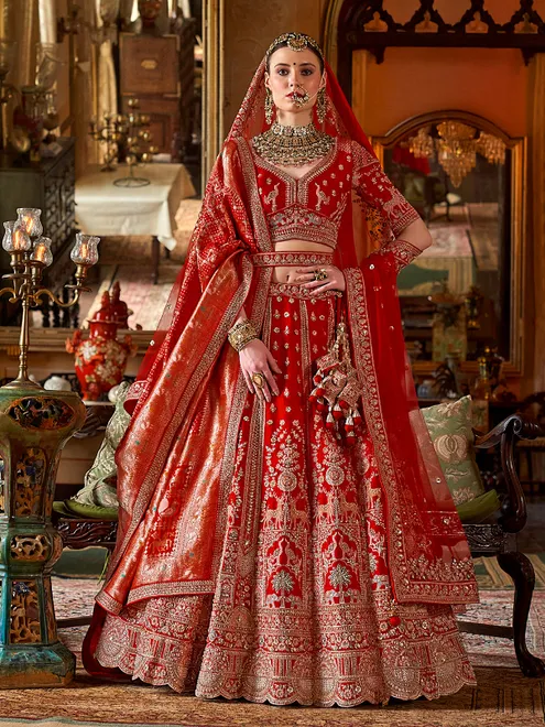 Red silk bridal lehenga choli with with beads and resham work