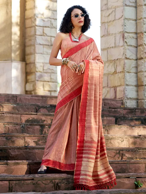 Red silk saree adorned with zari work