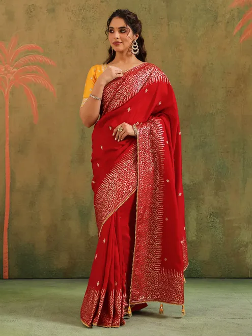 Red silk saree for wedding celebration