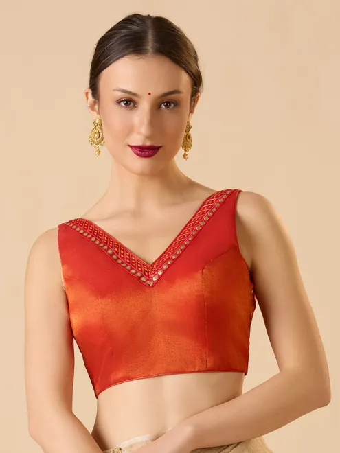 Red tissue V neck sleeveless blouse with festive glow