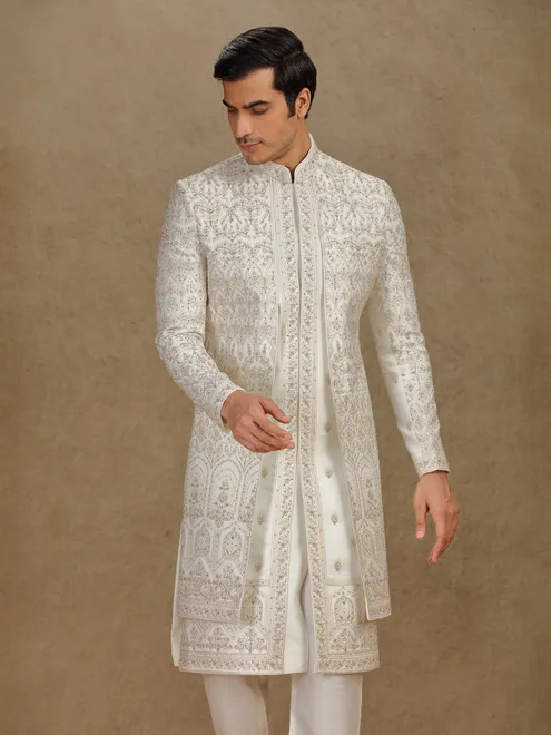 Regal cream silk sherwani with embroidery accents