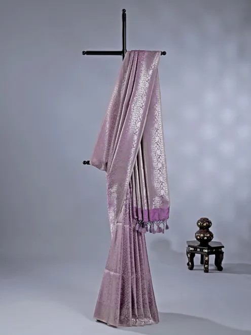 Royal purple silk saree with rich zari motifs