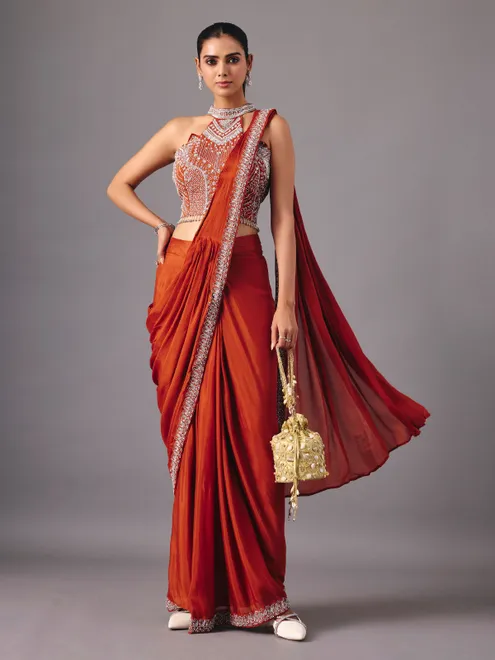 Rust orange ready to wear saree with embellished halter blouse