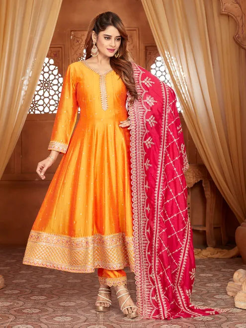 Rust orange silk anarkali sut with contrast dupatta