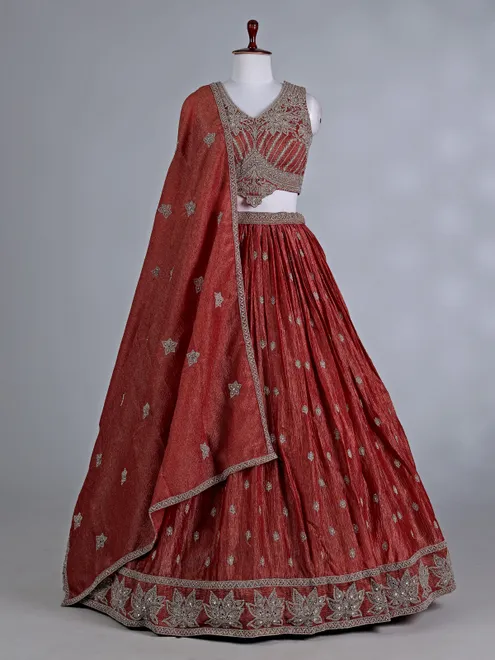 Rust orange silk wedding lehenga choli with stones work