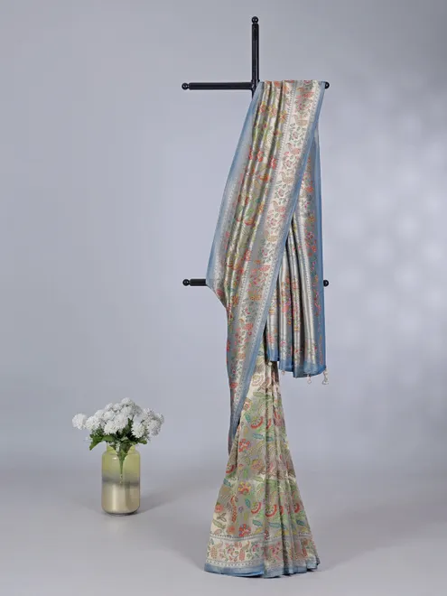 Stone blue shimmer dola silk saree with zari and print