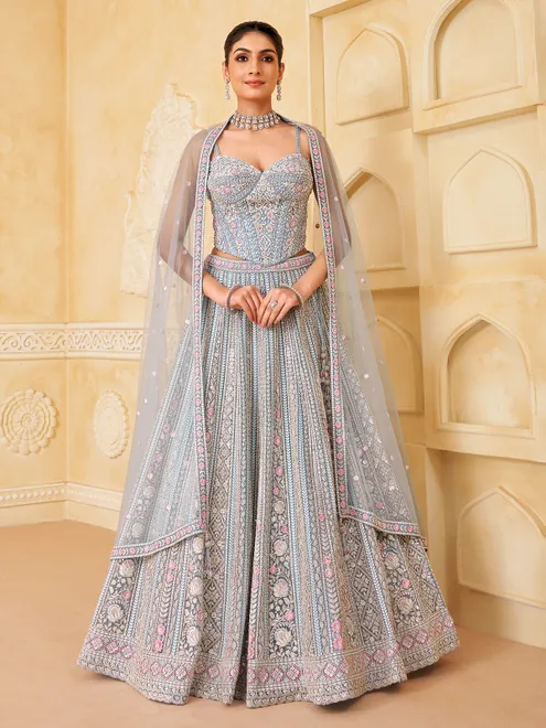 Stone blue silk lehenga choli with rich embellishment