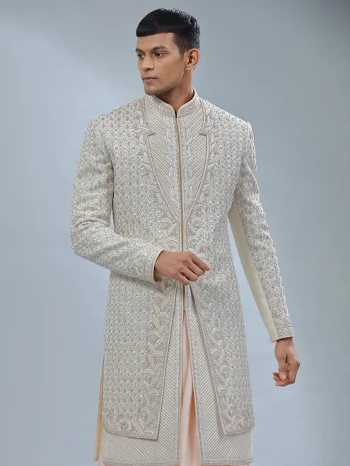 Stunning Off white and peach silk peshwai sherwani