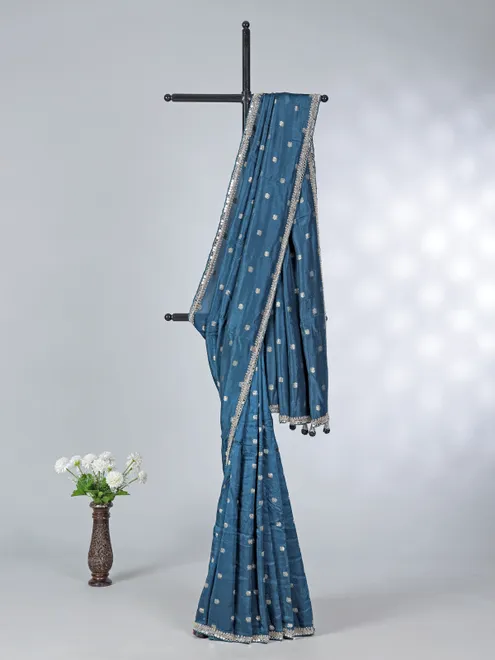 Teal blue dola silk saree with contrast pink blouse