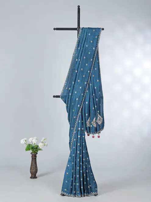 Teal blue dola silk saree with contrast red blouse