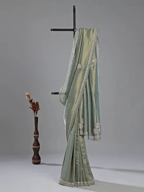 Teal blue tissue silk saree for festive glam