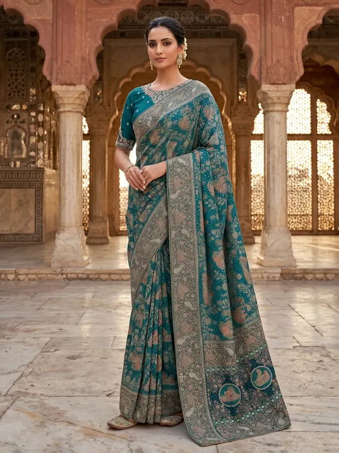 Teal green dola silk saree with royal motifs