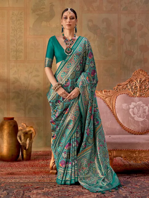Teal green festive woven silk saree with blouse