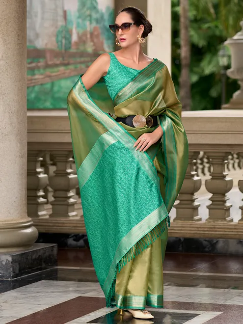 Trendy pastel green saree for festive