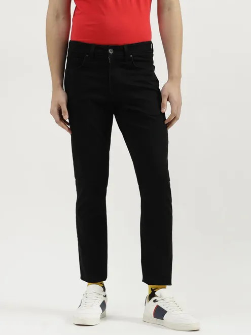UCB solid black skinny fit jeans