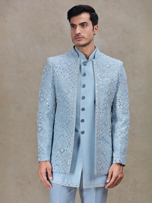Vibrant light blue indo western for wedding and reception