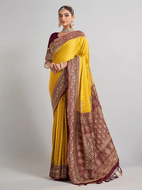 Vibrant mustard yellow satin silk saree for festive occasions