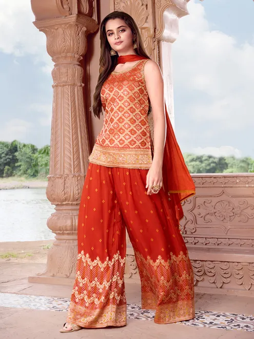 Vibrant orange silk palazzo suit for wedding wear