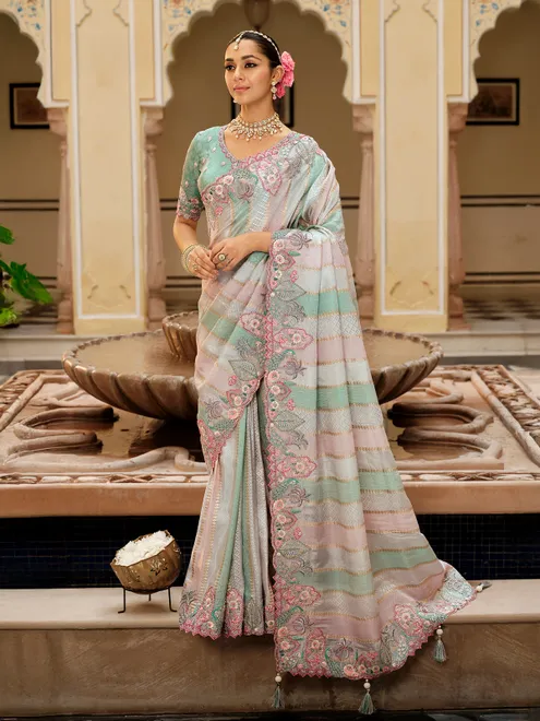 White and mint green silk saree for wedding