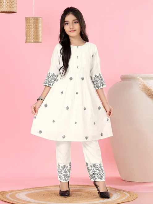 White cotton yoke style embroidered salwar suit