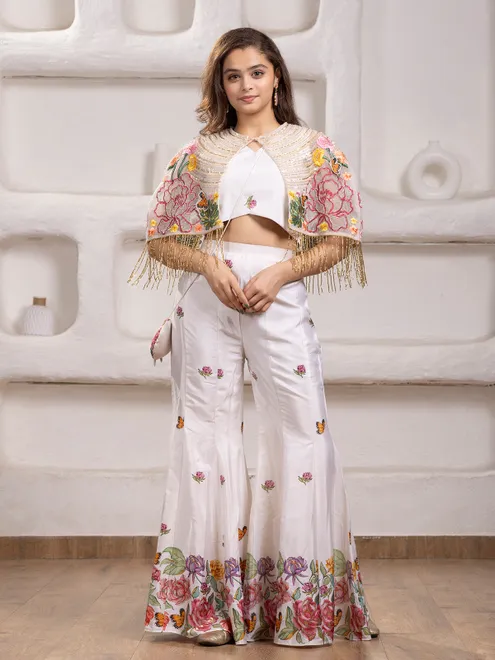 White silk palazzo salwar suit with heavy work jacket