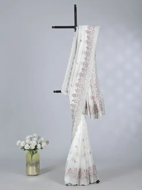 White tissue silk saree with sequins charm