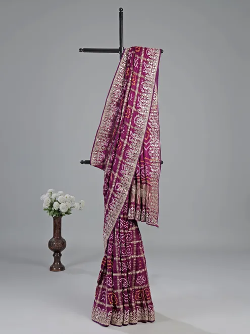 Wine bandhani saree with rich gota work