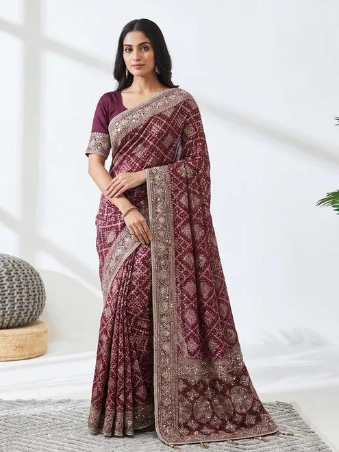 Wine georgette bandhej printed saree with festive elegance
