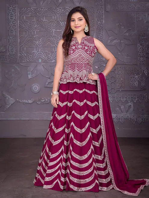 Wine silk lehenga choli with zari and stone embellishments