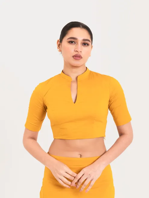 Yellow cotton lycra collar neck sleeveless blouse