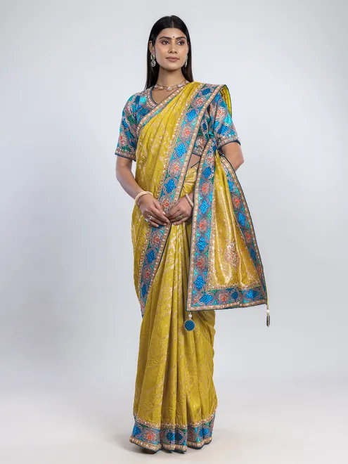 Yellow dola silk saree with contrast blue blouse