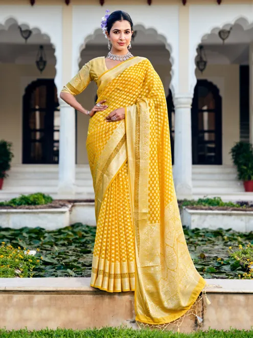 Yellow georgette saree with zari