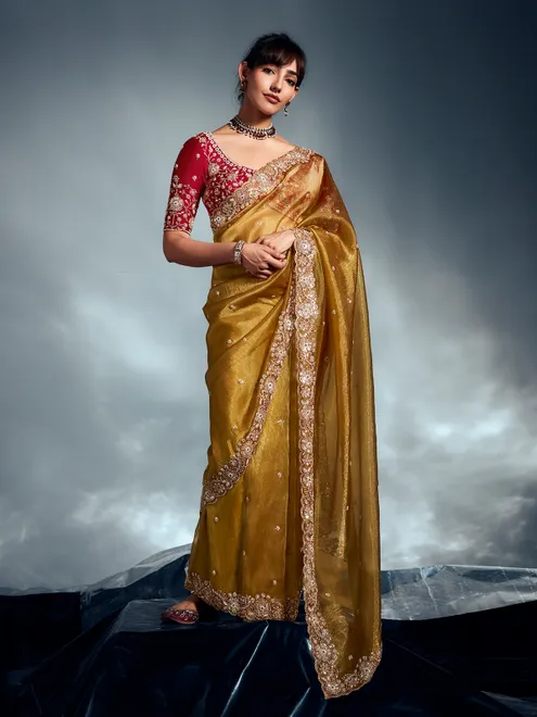 Yellow organza saree with sparkling accents