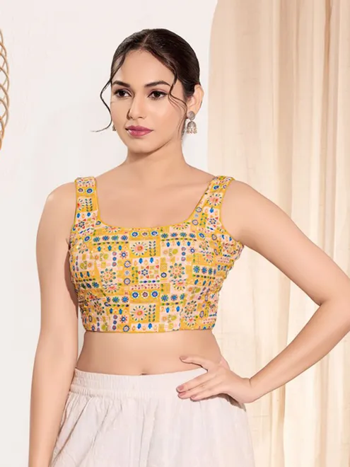 Yellow printed rayon sleeveless blouse