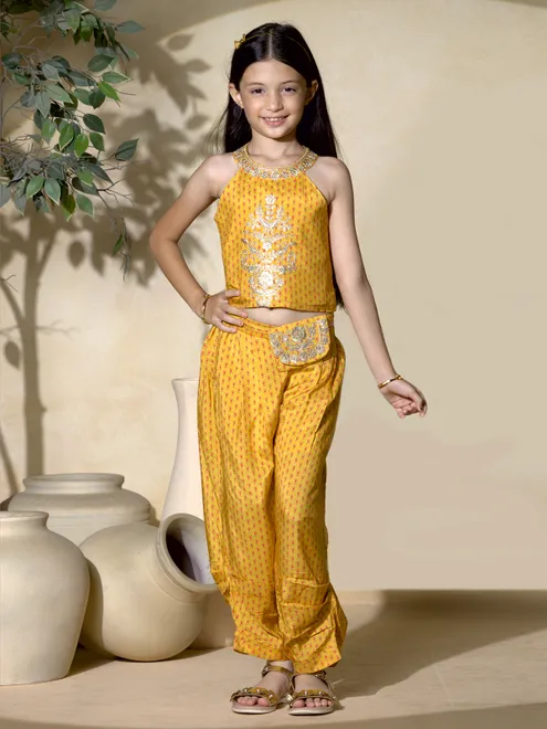 Yellow printed silk salwar suit for girls