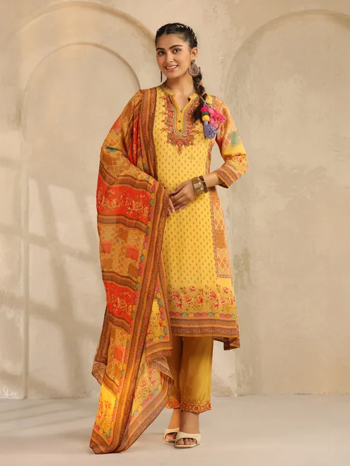 Yellow printed silk salwar suit with beads work