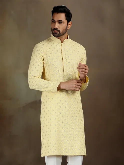 Yellow royan kurta set with subtle shine
