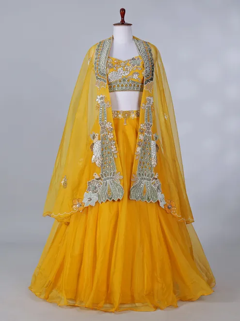 Yellow silk haldi wear lehenga choli with shrug